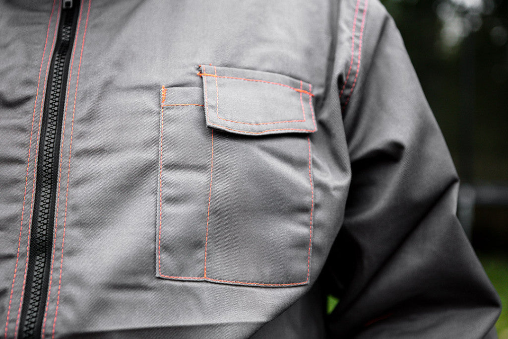 NEO TOOLS Munkavédelmi kabát, BASIC, XL/56, 35% pamut, 65% polyester, Többfunkciós zsebek, gumírozott derék, CE EN341 81-410-XL