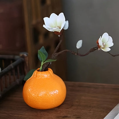 Stílusos narancssárga citrusforma váza